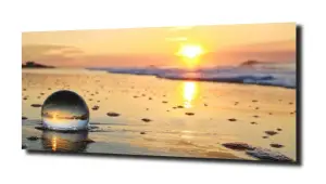 obraz na szkle Plaża zachód słońca kula  
