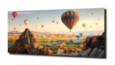 obraz na szkle Latające balony w górach 