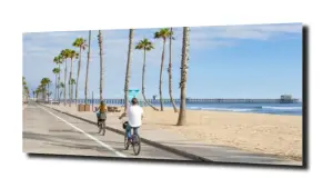 obraz na szkle Rowerzyści plaża Miami 