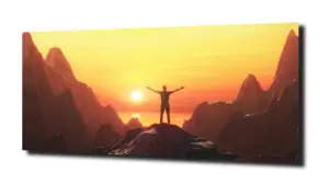 obraz na szkle Człowiek na szczycie 